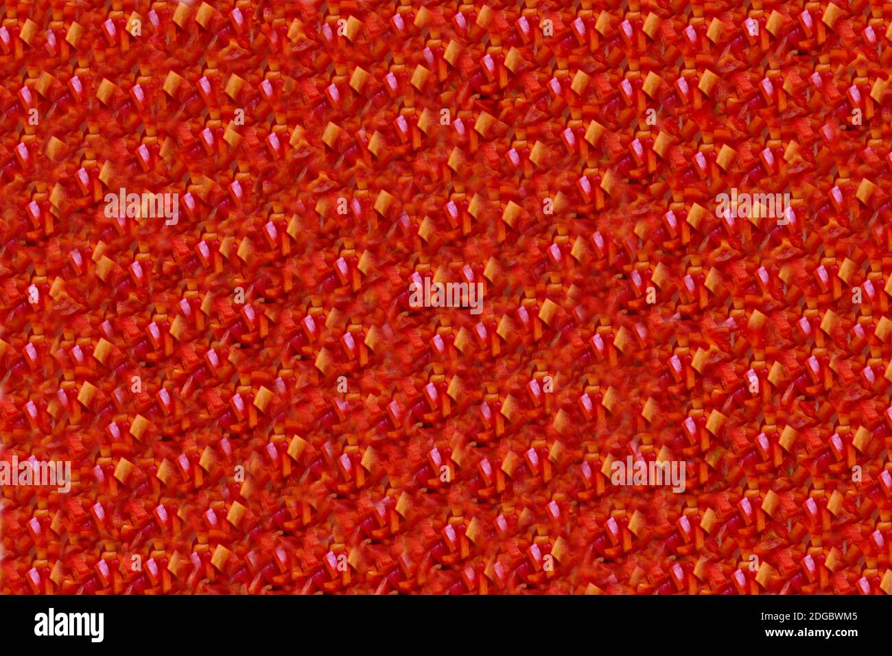 Textur von einem hellen roten Paprikapulver in Scheiben geschnitten Stockfoto