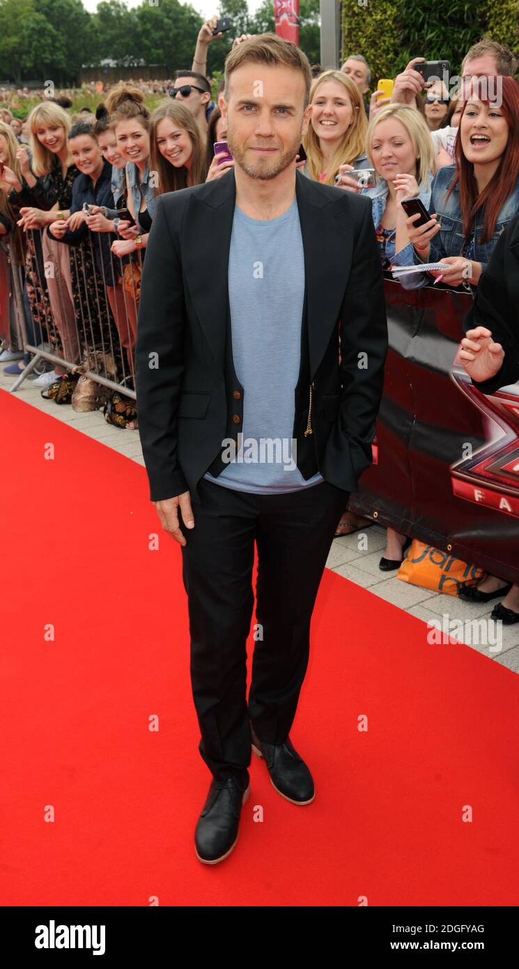 Gary Barlow kommt bei den X Factor Auditions in der LG Arena in Birmingham an. Stockfoto