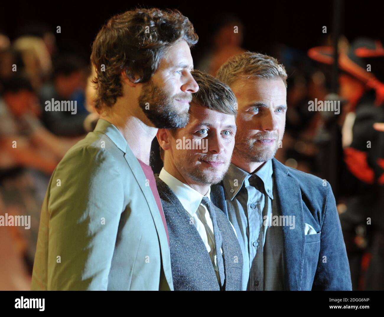 Howard Donald, Mark Owen und Gary Barlow von Take That kommen bei der Weltpremiere der drei Musketiere in 3D, Westfield Shopping Centre, London. Stockfoto