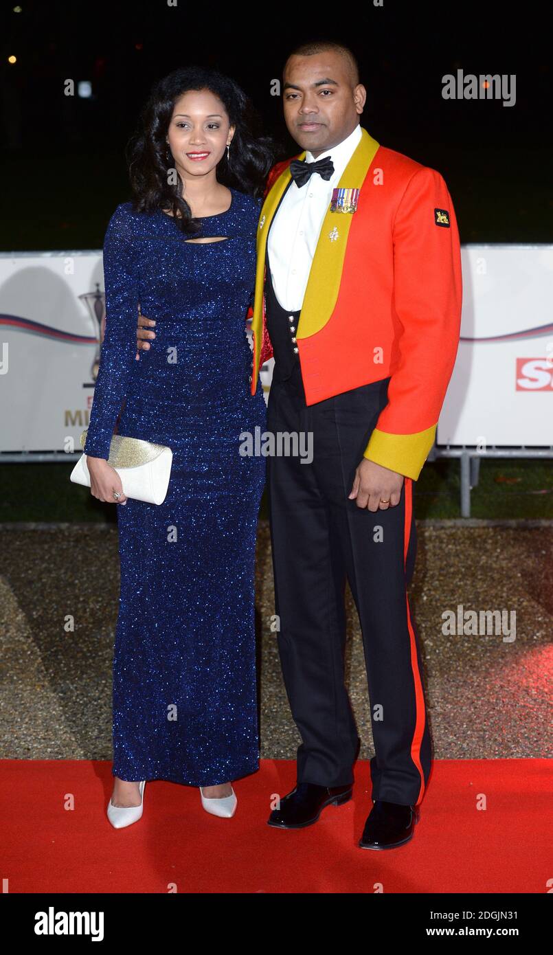 Mallissa Beharry und Lance Corporal Johnson Beharry bei der Ankunft in EINER Nacht der Helden : die Sun Military Awards 2014, Greenwich Maritime Museum, London. Stockfoto
