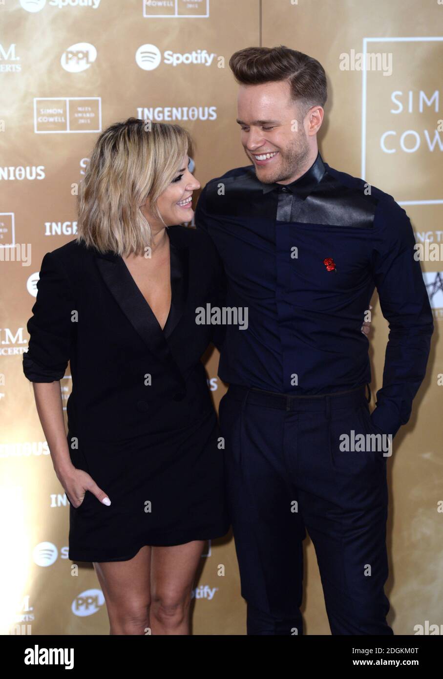 Caroline Flack und Olly Murs beim Music Industry Trust Award (MITS) zugunsten der Wohltätigkeitsorganisationen Nordoff Robbins und des Brit Trust. In diesem Jahr wird der Preis an Simon Cowell verliehen. Statt im Grosvenor House Hotel, London. Foto-Kredit sollte Doug Peters / EMPICS Entertainment lesen Stockfoto