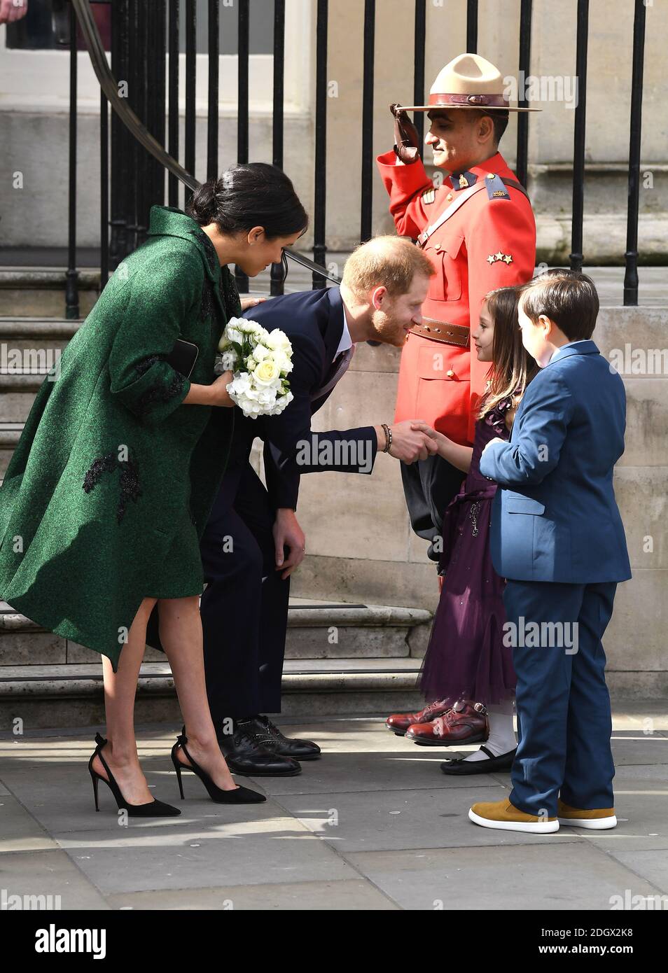 Meghan, Herzogin von Sussex und Prinz Harry, Herzog von Sussex, trifft einen jungen Jungen und ein Mädchen, nachdem sie den Commonwealth Service im Canada House, London besucht haben. Bildnachweis sollte lauten: Doug Peters/EMPICS Stockfoto