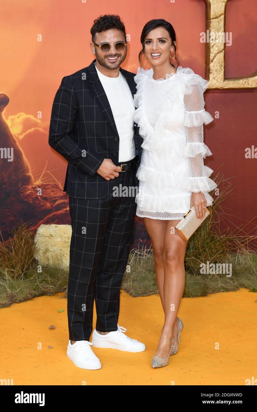 Lucy Meckenburgh und fiancŽ Ryan Thomas bei der Europa-Premiere von The Lion King, Odeon Cinema, Leicester Square, London. Bildnachweis sollte lauten: Doug Peters/EMPICS Stockfoto