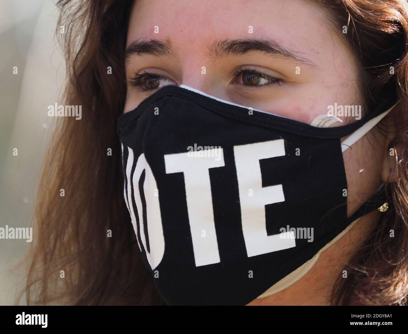 Atlanta, Georgia, USA. Dezember 2020. Ein Wähler in Georgien erinnert andere daran, bei den bevorstehenden Abwahl-Wahlen im Senat abzustimmen. Quelle: Sue Dorfman/ZUMA Wire/Alamy Live News Stockfoto