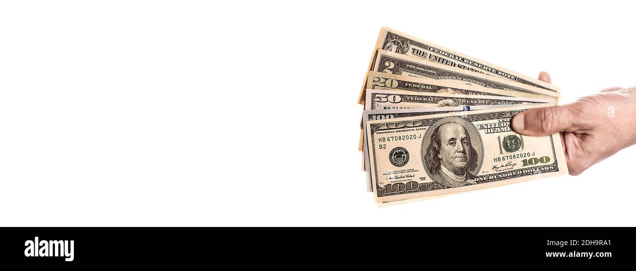 Hand hält Geld Dollar, isoliert auf weißem Hintergrund. Hand mit Geld mehr hundert Dollar. Langes, breites Banner mit Platz für Text. Stockfoto