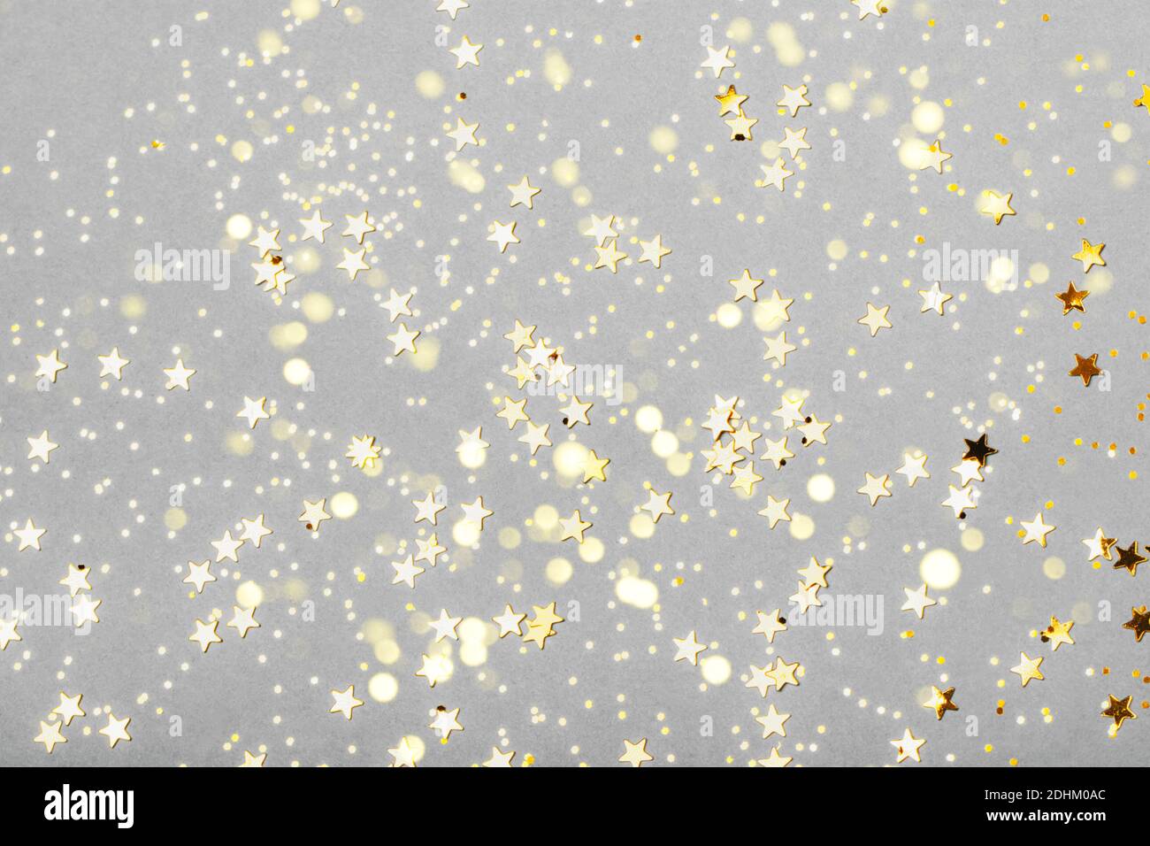 Festliche trendige gelb und grau Hintergrund mit Funkeln und Sternen. Das Konzept der Feier, der Tag der St. Valentine, Neujahr, Geburtstage, Zeremonien, Veranstaltungen, etc. Stockfoto