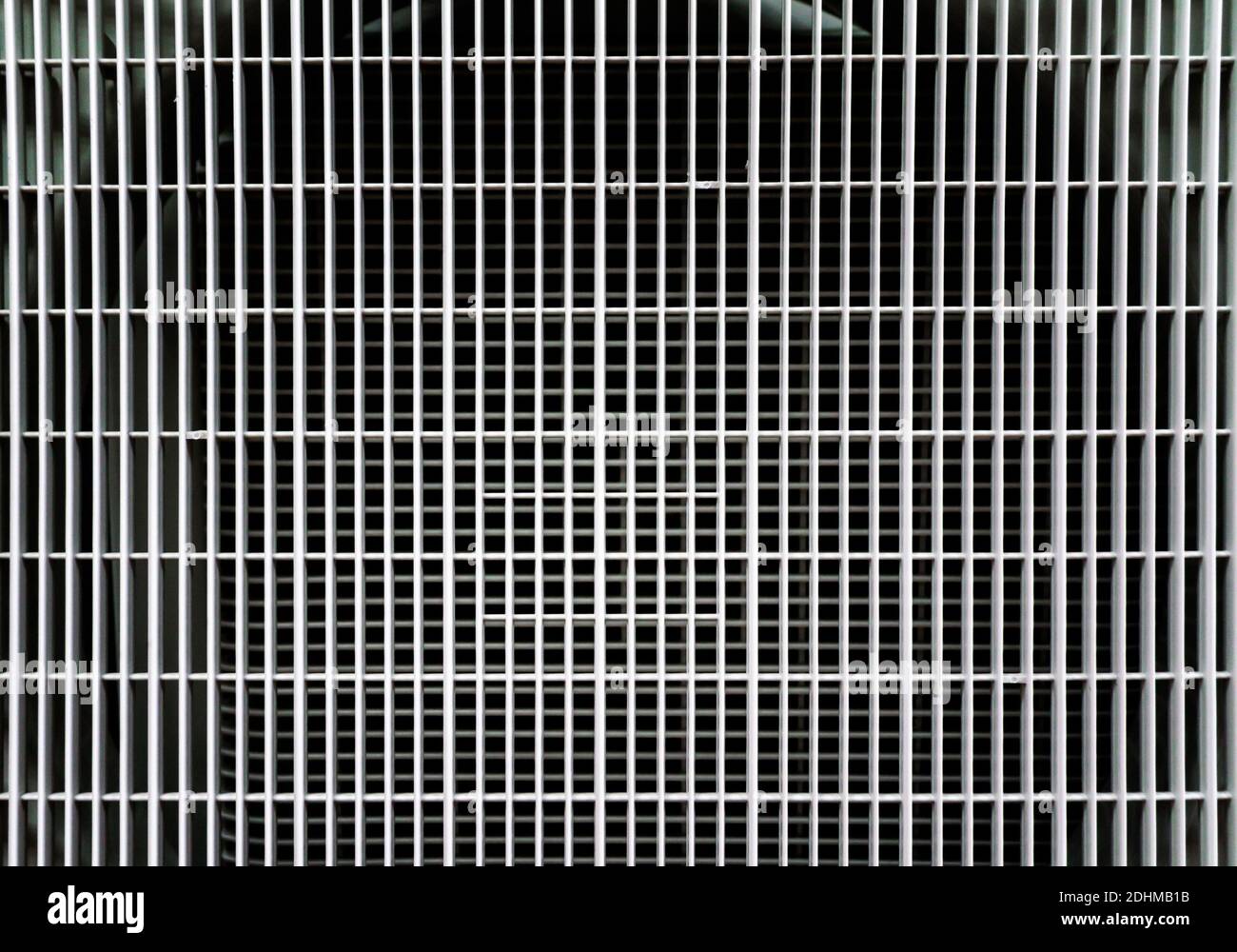 Grau Gitter abstrakt geometrischen Hintergrund Muster close up Stockfoto