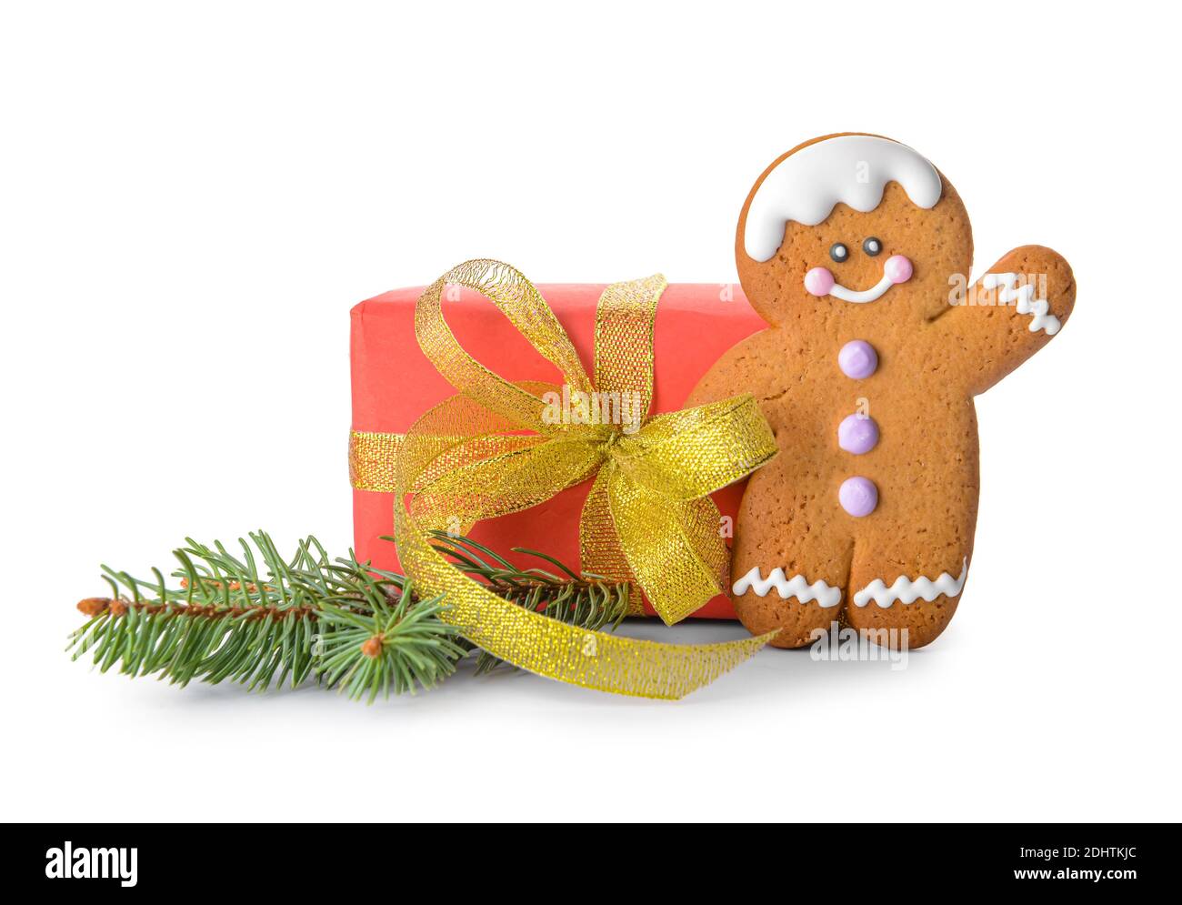 Weihnachtskomposition mit Lebkuchenkekse und Geschenk auf weißem Hintergrund Stockfoto