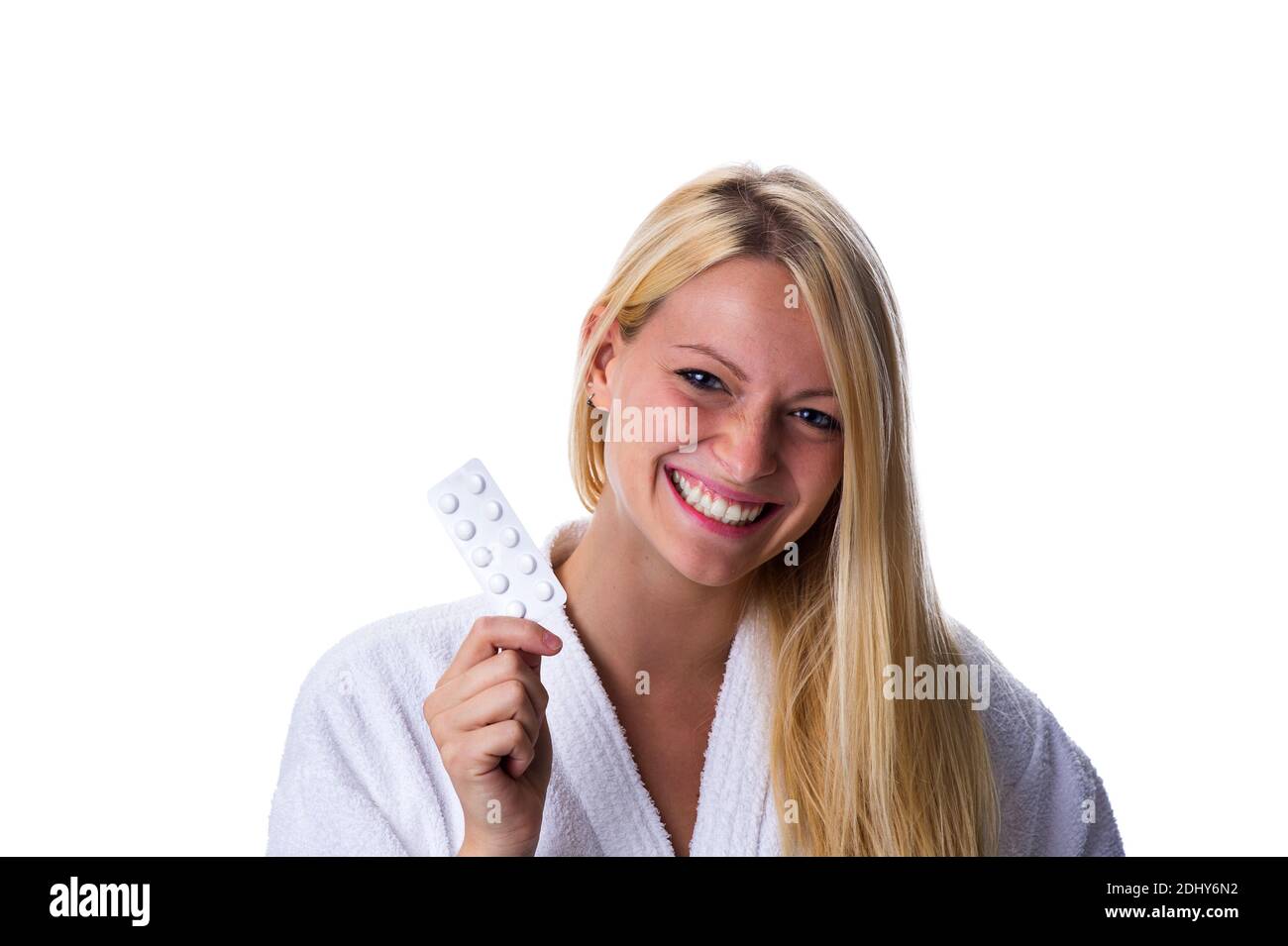 Frau mit Pillenpackung im Mund, Antibaby-Pille, Antibabypille, Model Release, Stockfoto