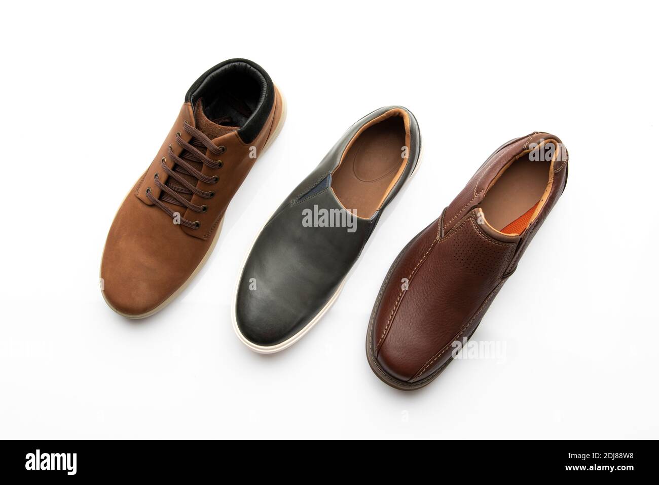 Draufsicht auf verschiedene Schuhe isoliert auf weißem Hintergrund Stockfoto