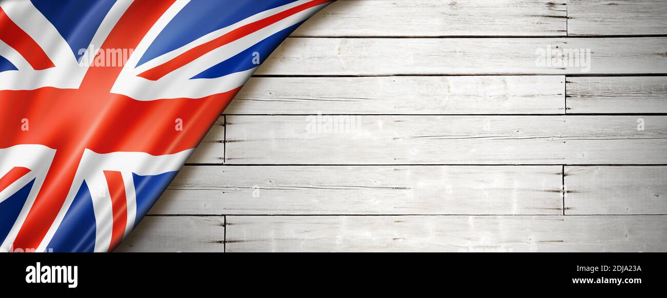 Großbritannien, britische Flagge auf alter weißer Wand. Horizontales Panorama-Banner. Stockfoto