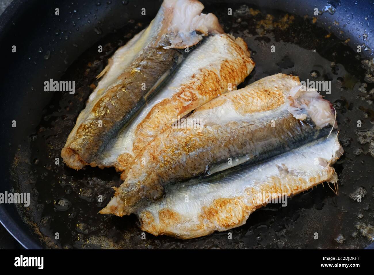 Hering in Butter gebraten - John Gollop Stockfoto
