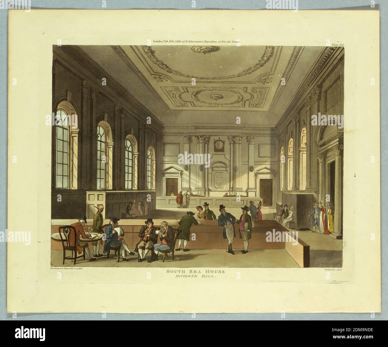 South Sea House Dividend Hall, aus 'Ackermann's Repository', Thomas Rowlandson, britisch, 1756–1827, Augustus Charles Pugin, französisch, aktiv Großbritannien, ca. 1762–1832, Thomas Sutherland, britisch, 1785 - 1838, Aquatint, Pinsel und Aquarell auf Papier, GROSSER Raum mit Säulen und tiefen Fenstern. Ein paar Leute, einer an einem Tisch im linken Vordergrund, schreiben. Titel, Künstler und Verlegernamen unten., Europa, London, England, 1810, Print Stockfoto