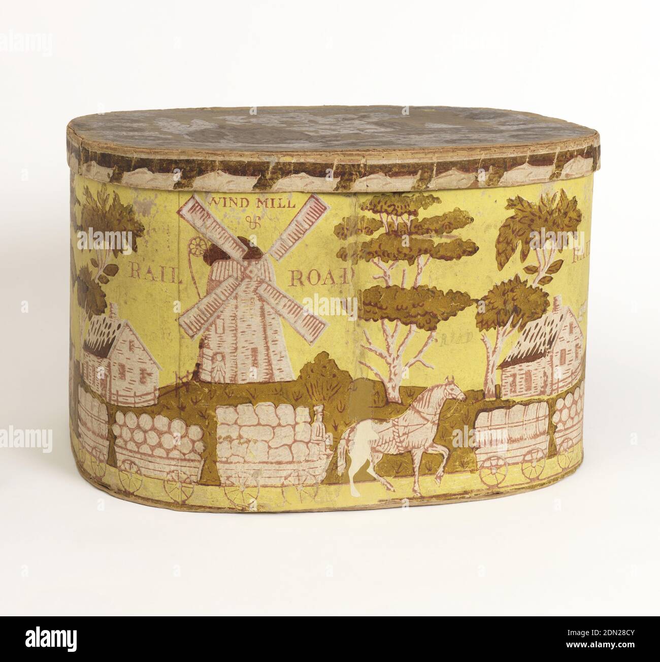 Windmühle und Eisenbahnstraße, Blockdruck auf handgefertigtem Papier, Pasteboard-Unterstützung, Windmühle und Eisenbahn, drei beladene Autos von einem Pferd gezeichnet, an der Seite. Oben hat Häuser und Bäume, mit einem Rand von Blumen. Gedruckt am Himmel: 'Windmühle & Bahnstraße'. Gedruckt in rot und grün auf gelbem Grund., USA, ca. 1830, Wandbeläge, Bandbox und Deckel, Bandbox und Deckel Stockfoto