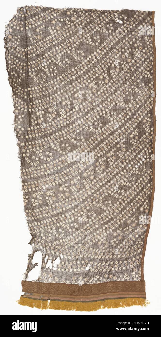 Textil, Medium: Baumwolle, Wolltechnik: Komplementärgewebe, Resist-Dye (Krawatte); STOFF NR. 1: Offen gewebte Leinwandbindung, Baumwolle; STOFF NR. 2: Band (5 cm breit): Leinwandbindung mit Kettmuster, aus Baumwolle; STOFF NR. 3: Band (3 cm breit): Leinwandbindung mit Kettmuster, Baumwolle; STOFF NR. 4: Tape-Franse (3.5 cm breit): Leinwandbindung mit Schnittschlaufen aus Vliessweff für Fransen 2.5 cm lang, Wolle; STOFF NR. 5: Band (1 cm breit): Leinwandbindung mit Kettmuster, Muster aus extra Schussflossen, Baumwolle, Mantelteil; aus 5 separat gewebten Stoffen Stockfoto