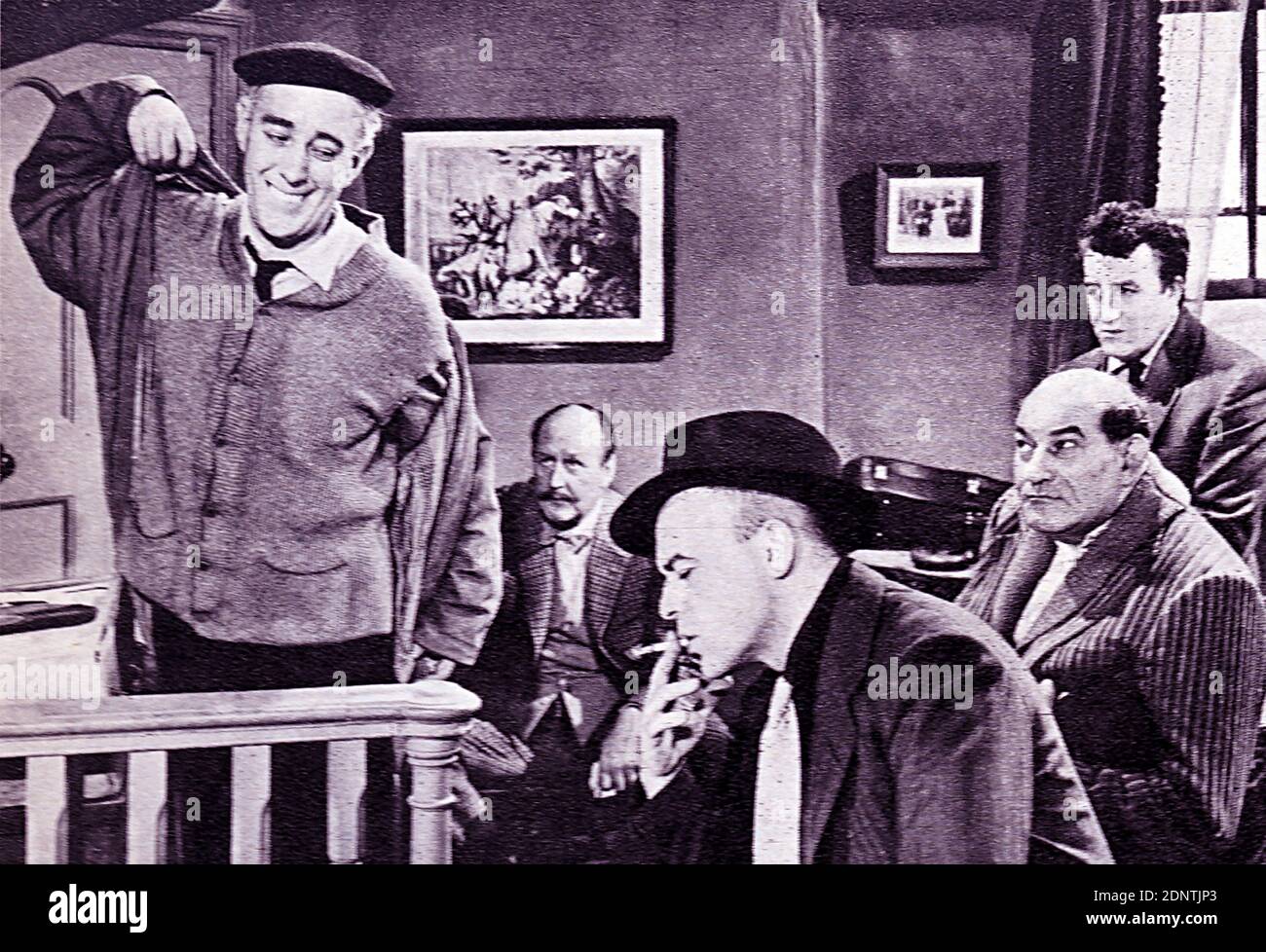 Filmstill aus 'The Ladykillers' mit Alec Guinness, Peter Sellers, Katie Johnson und Herbert Lorn. Stockfoto
