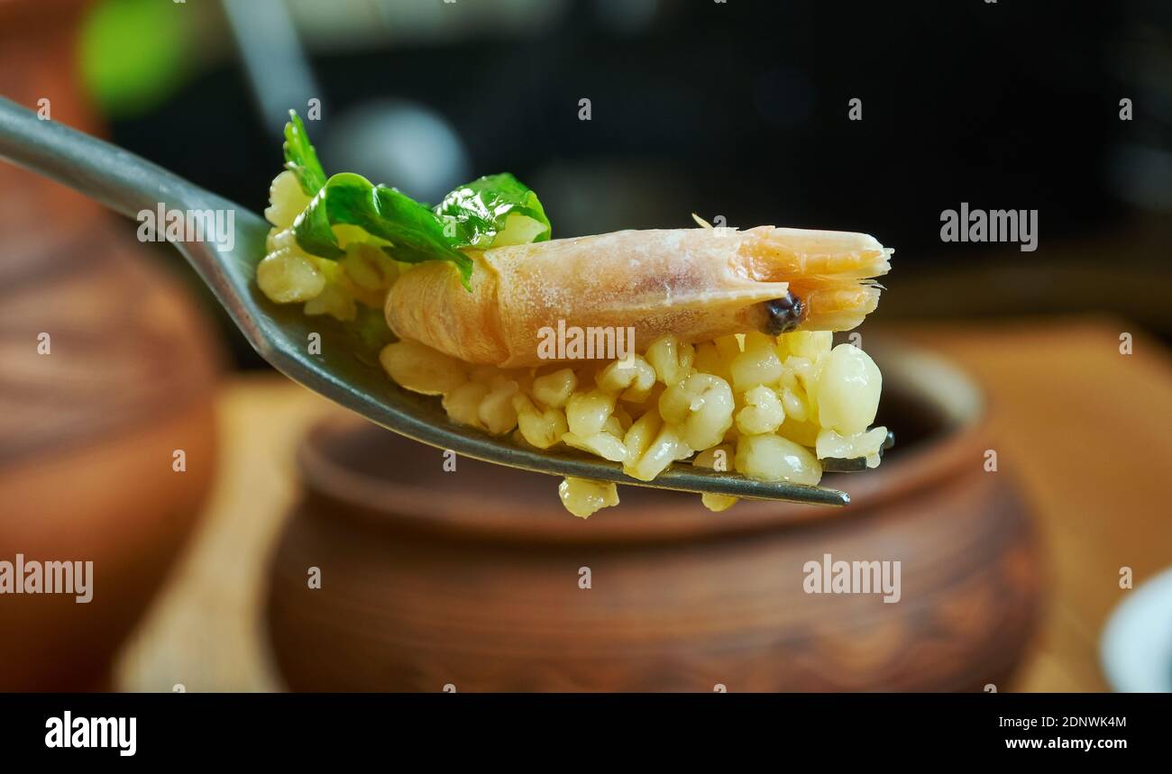 Bulgur di Pesce - Italienischer Bulgur mit Venusmuscheln Stockfoto
