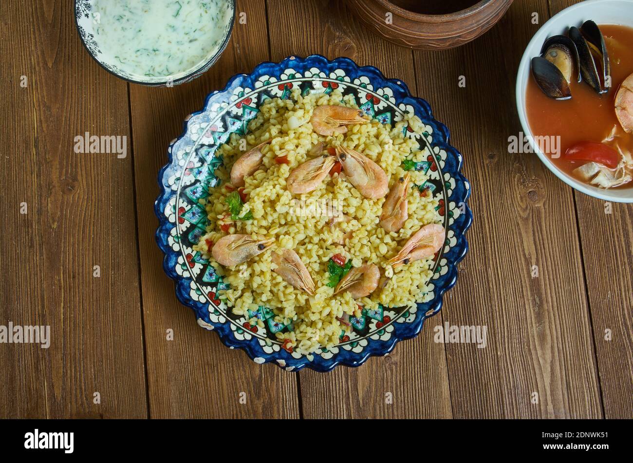Bulgur di Pesce - Italienischer Bulgur mit Venusmuscheln Stockfoto