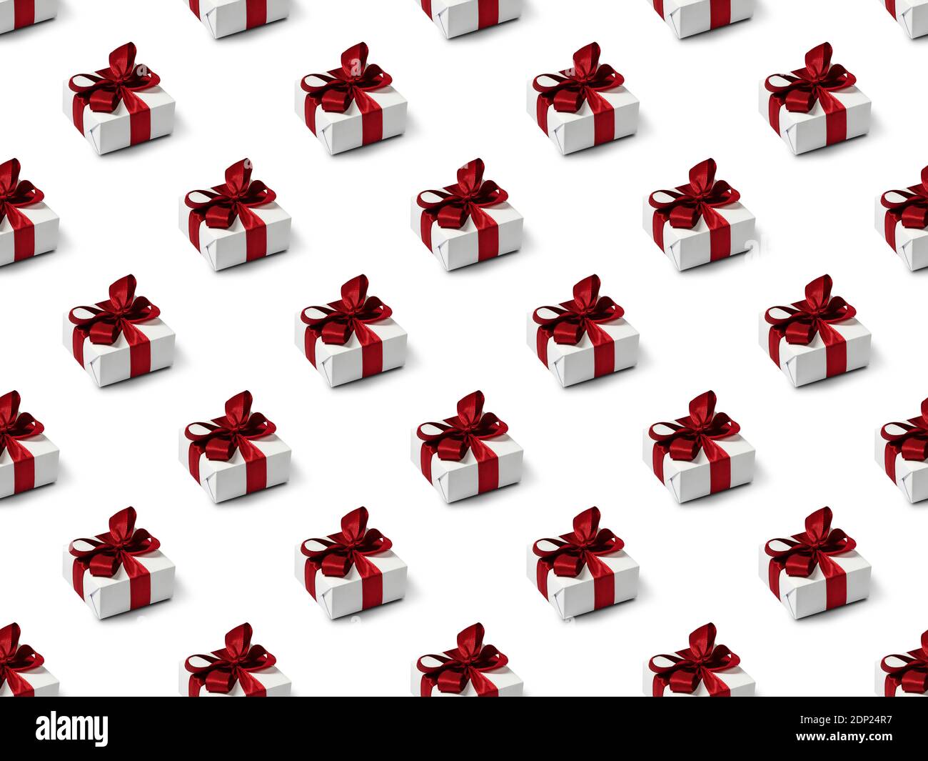 Nahtloses Muster mit niedlichen Geschenken auf weißem Hintergrund. Weihnachts- und Weihnachtsdekorationen. Boxtag. Stockfoto