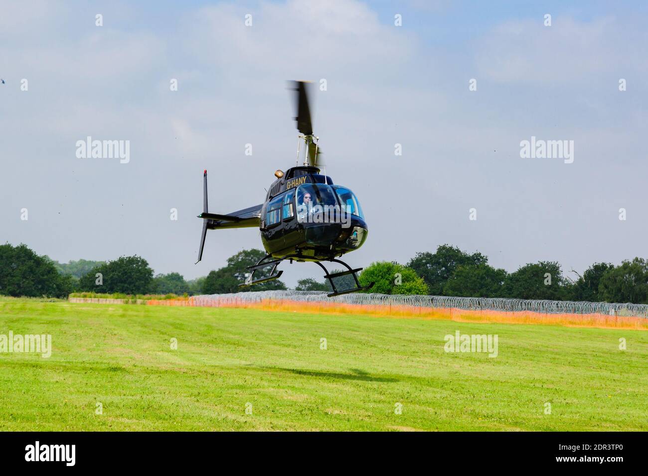 Agusta-Bell 206B JetRanger III Landung mit Passagieren. Ein beliebter leichter Fünfsitzhubschrauber der Typ wurde in den 1970er Jahren eingeführt Stockfoto