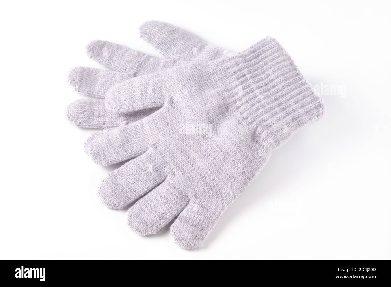 Grau gefärbte Winterhandschuhe isoliert auf weiß Stockfoto