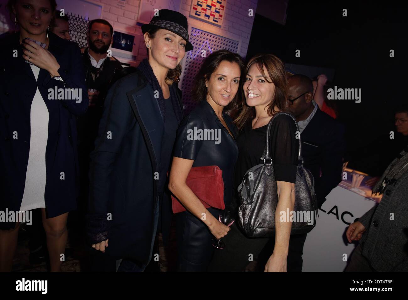 Julie Ferrier, Emmanuelle Demaison und Shirley Bousquet bei der Lacoste Party in Paris, Frankreich am 17. Januar 2014. Foto von Jerome Domine/ABACAPRESS.COM Stockfoto