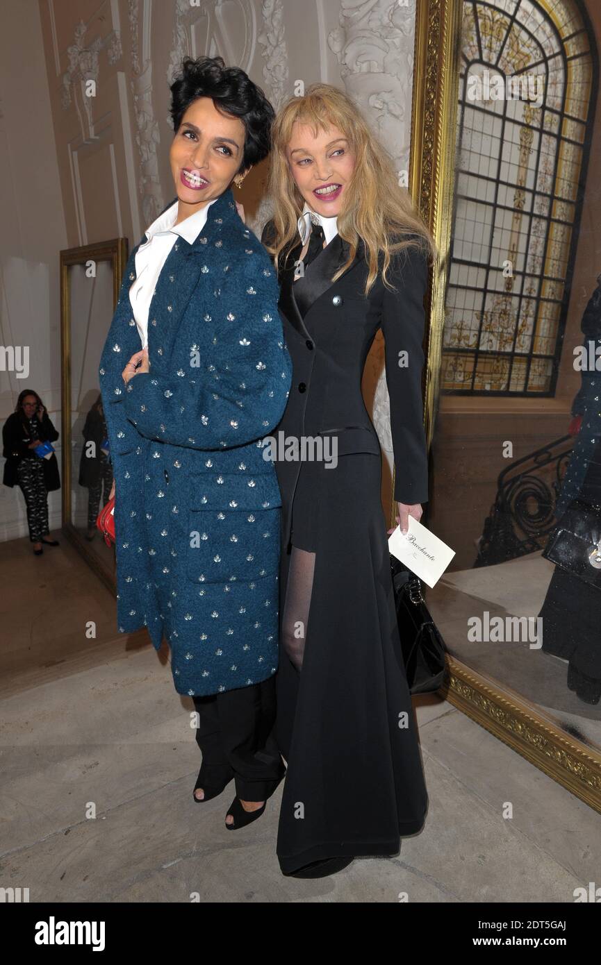 Farida Khelfa und Arielle Dombasle kommen zu Jean-Paul Gaultiers Frühjahr/Sommer 2014 Kollektion Show, die während der Paris Haute-Couture Fashion Week, die am 22. Januar 2014 in Paris, Frankreich, stattfand, präsentiert wurde. Foto von Christophe Guibbaud/ABACAPRESS.COM Stockfoto