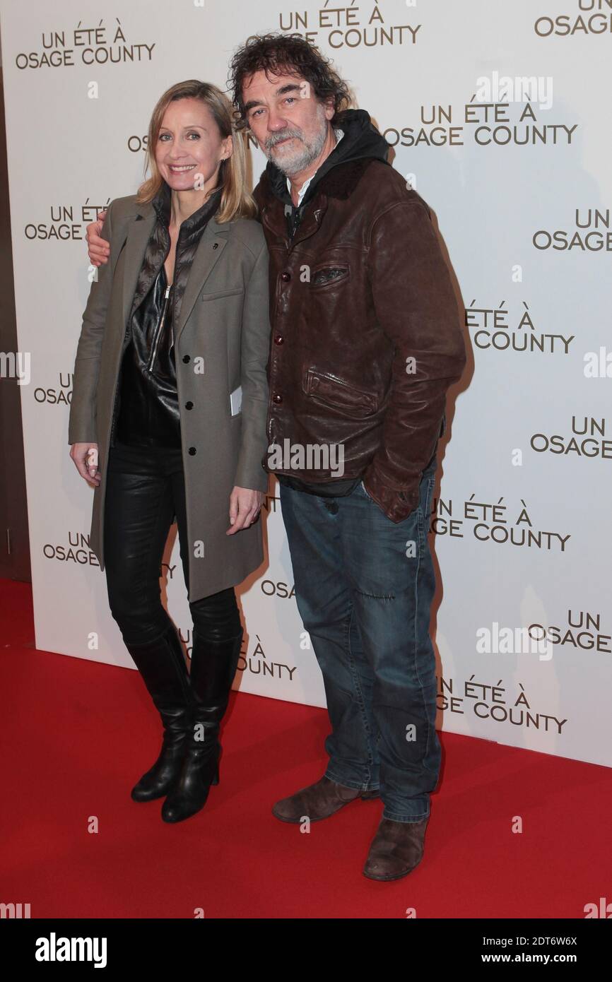 Olivier Marchal und seine Frau Catherine bei der Premiere von "UN Ete A Osage County" am 13. Februar 2014 im UGC Normandie in Paris, Frankreich. Foto von Audrey Poree/ABACAPRESS.COM Stockfoto
