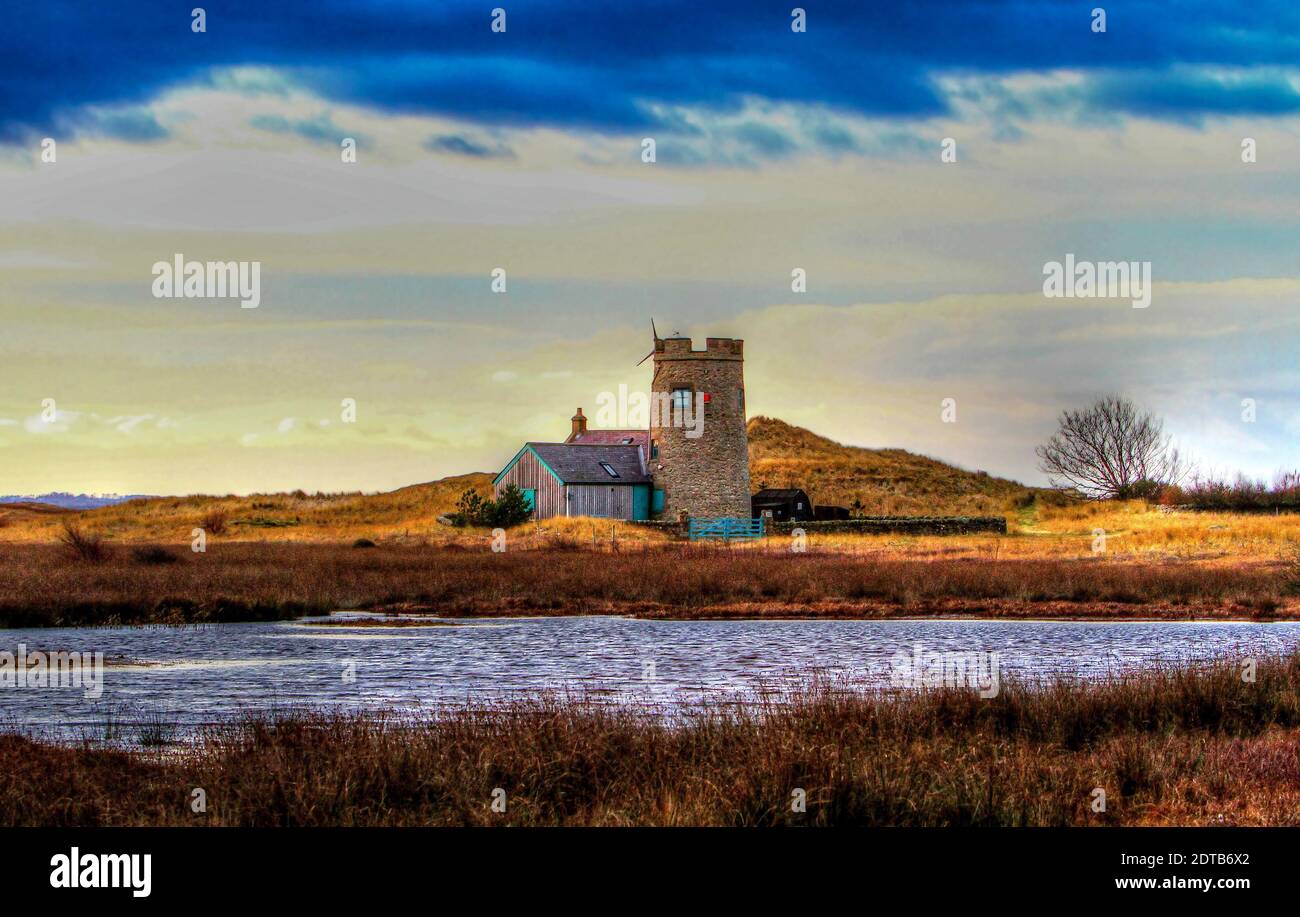 Haus und Turm am Snook auf der Heiligen Insel. Stockfoto