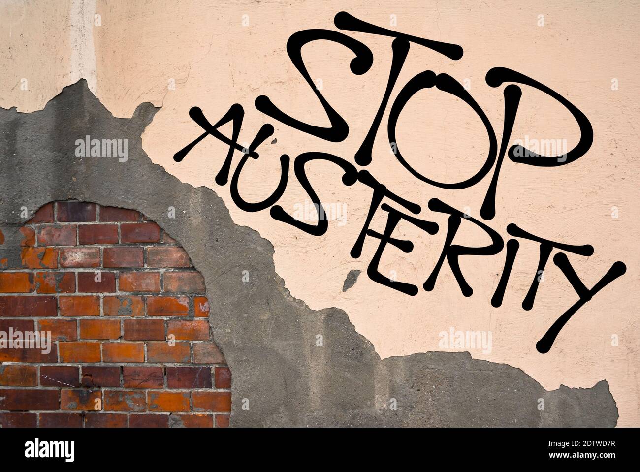 Schluss mit der Sparsamkeit - handgeschriebene Graffiti an die Wand gesprüht, anarchistische Ästhetik. Protest gegen die Wirtschaftspolitik der Reduzierung von Schulden und Haushalt def Stockfoto