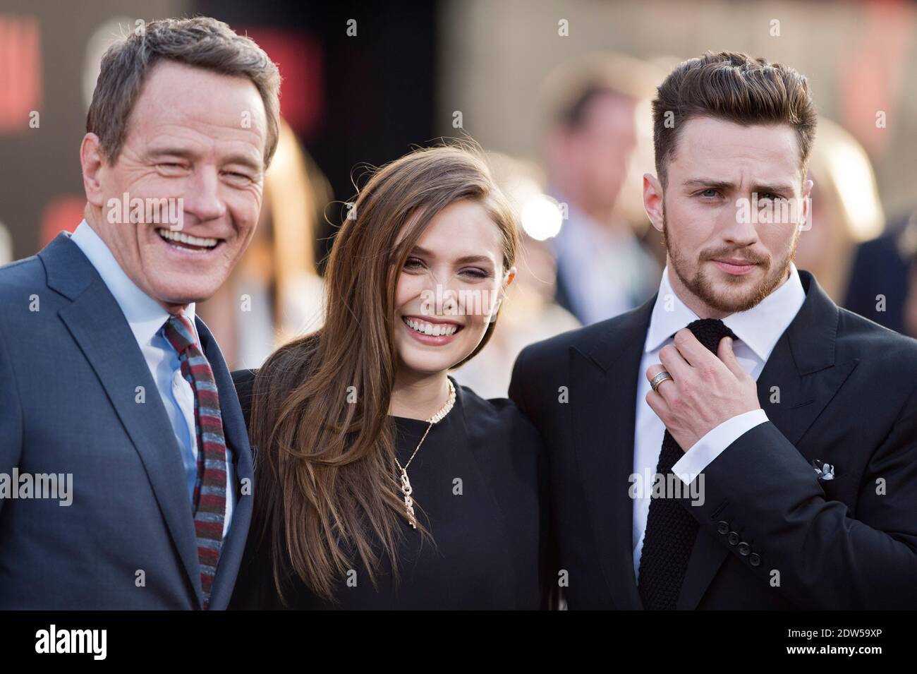 Bryan Cranston, Elizabeth Olsen und Aaron Taylor-Johnson besuchen am 8. Mai 2014 die Premiere von Warner Bros. Pictures and Legendary Pictures' 'Godzilla' im Dolby Theater in Los Angeles, CA, USA. Foto von Lionel Hahn/ABACAPRESS.COM Stockfoto