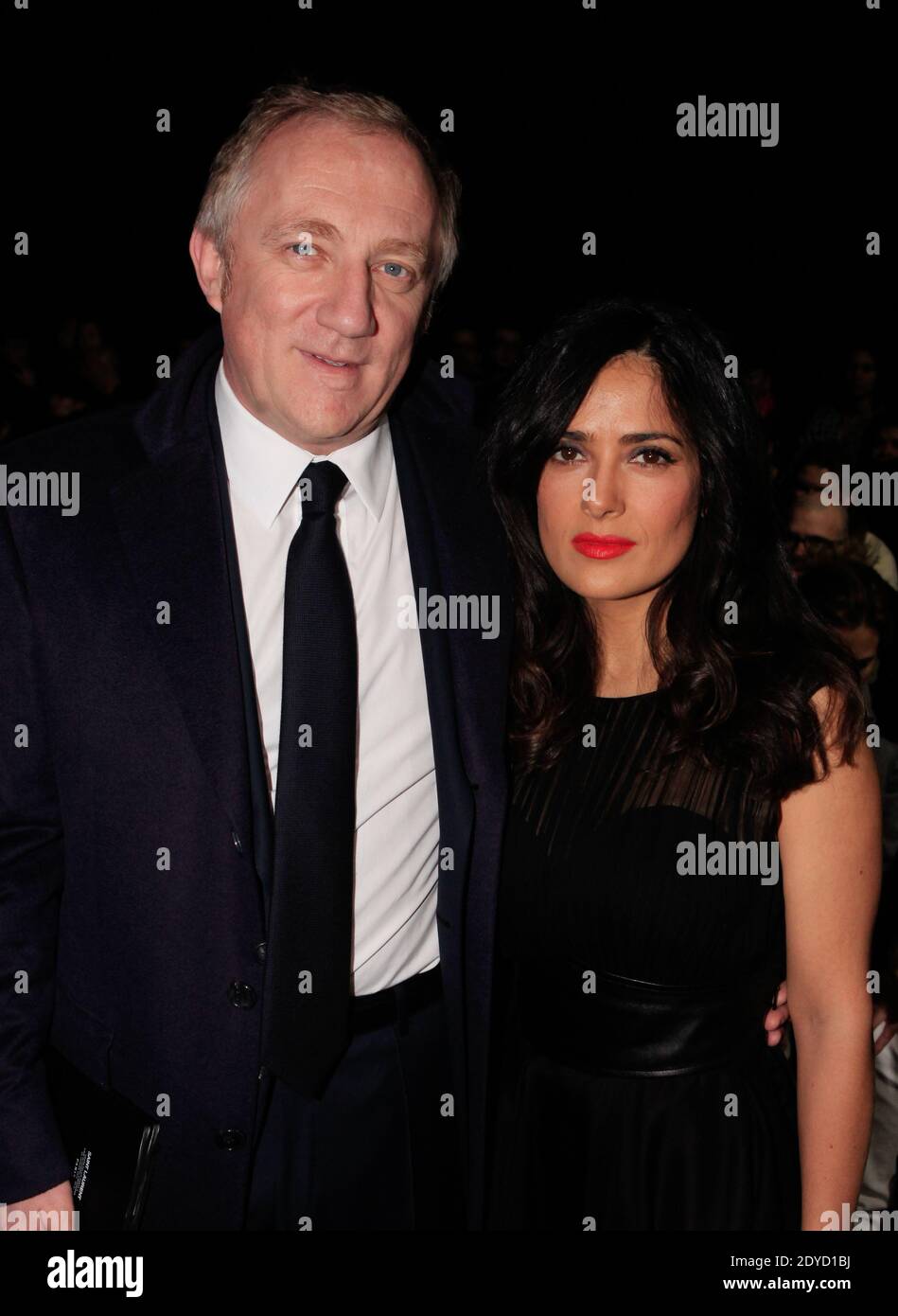 Francois-Henri Pinault und Salma Hayek in der ersten Reihe bei der Präsentation der Herren Herbst-Winter 2013-2014 Kollektion im Rahmen der Paris Fashion Week am 20. Januar 2013 in Paris. Foto von Jerome Domine/ABACAPRESS.COM Stockfoto