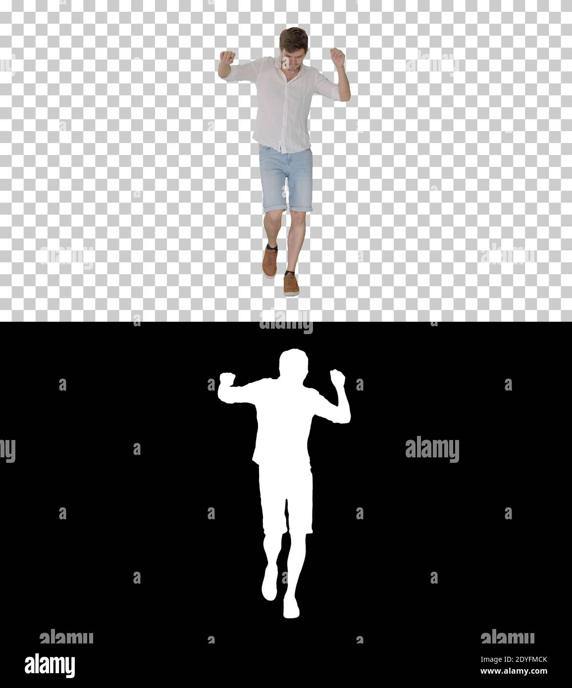 Fröhlicher junger Mann in lässiger Kleidung tanzt glücklich während walki Stockfoto