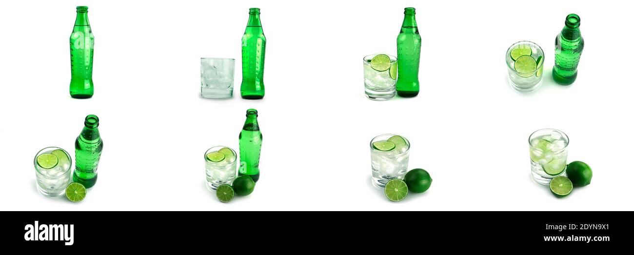Grüne Flasche und transparentes Glas mit Limettenlimonade auf weißem Hintergrund. Hochwertige Fotos Stockfoto