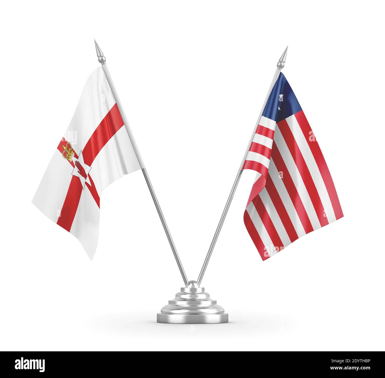 Liberia und Nordirland Tischflaggen isoliert auf weißem 3D Rendering Stockfoto