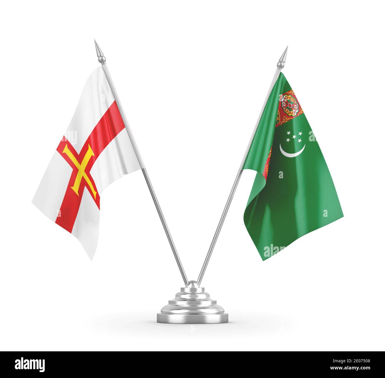 Turkmenistan und Guernsey Tischflaggen isoliert auf weißem Hintergrund 3D Rendering Stockfoto