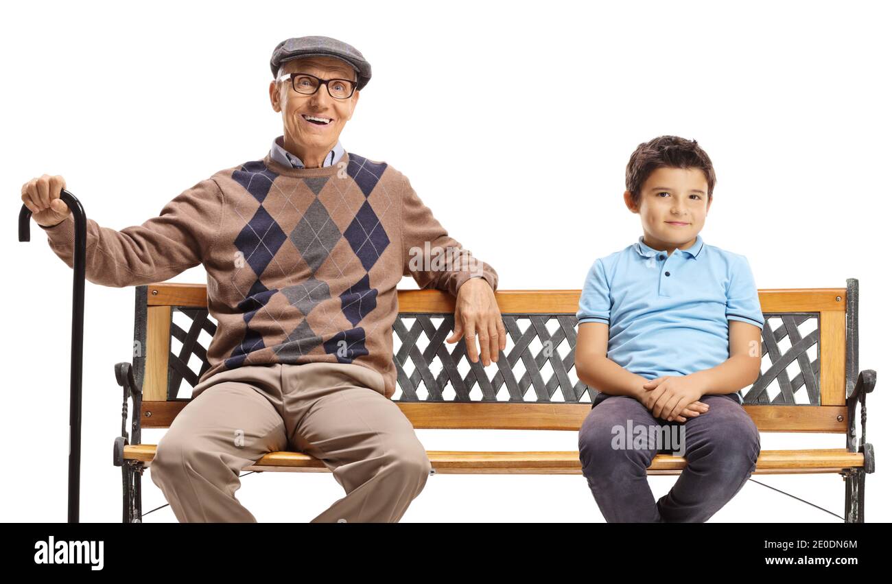 Kind auf einer Bank mit seinem Großvater isoliert auf weiß Hintergrund Stockfoto