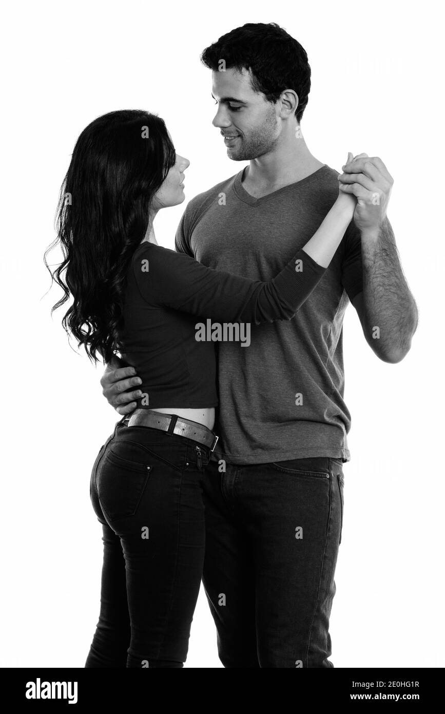 Profil anzeigen von jungen glückliches Paar Lächeln beim Tanzen zusammen Stockfoto