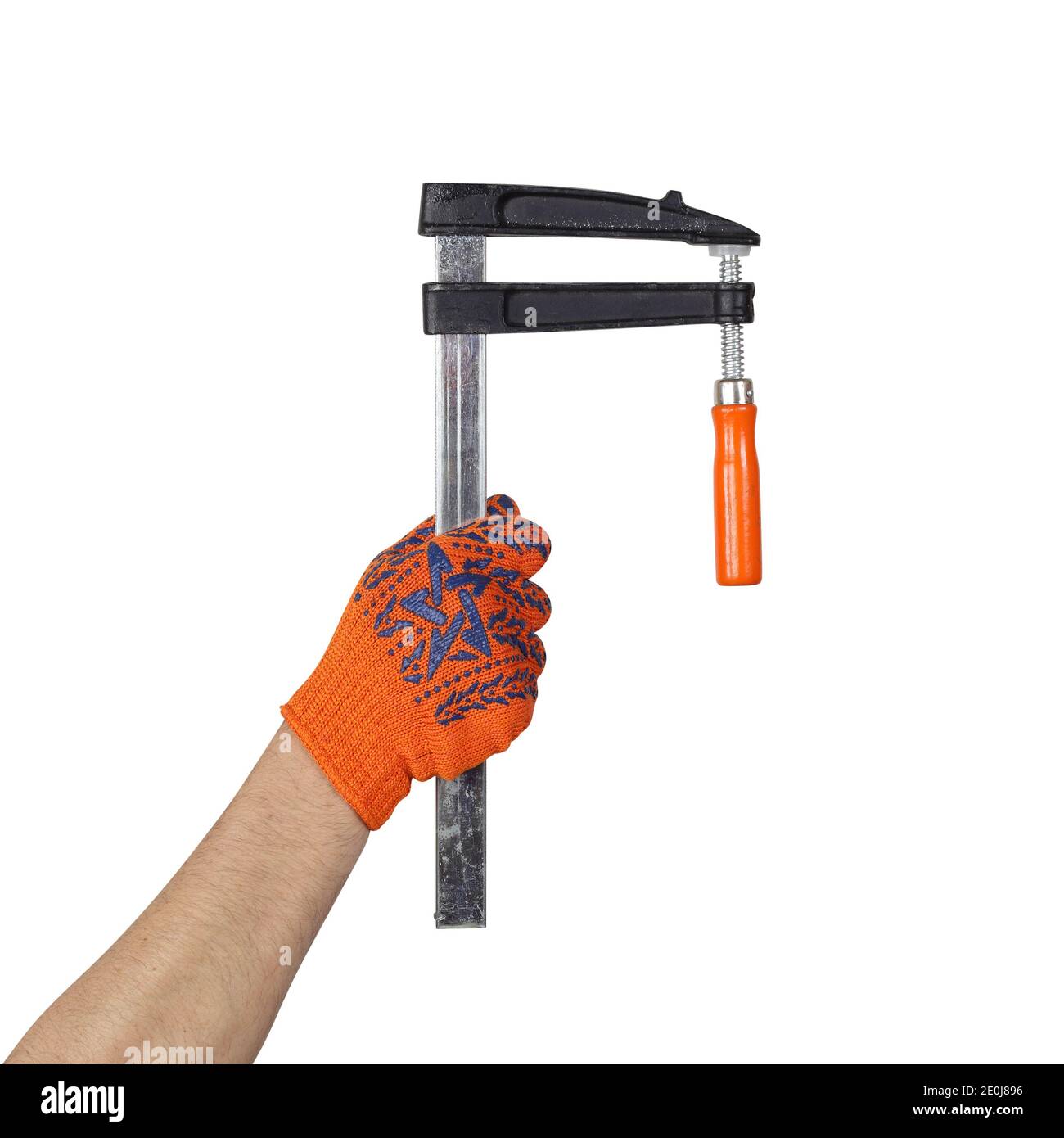 Objekte Hände Aktion - Hand in Arbeit Handschuh hält F-clamp Speed Clamp isoliert weißen Hintergrund. Stockfoto