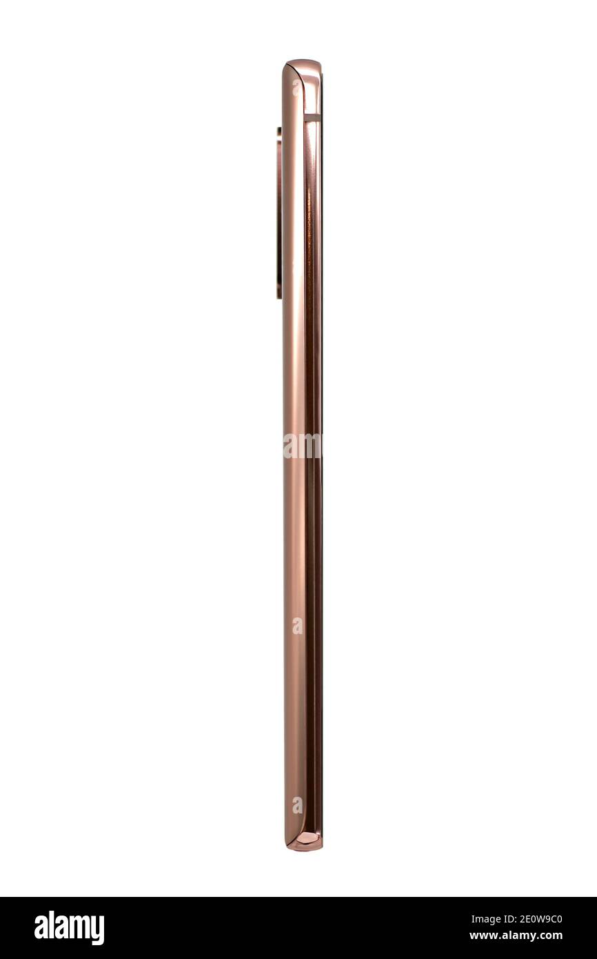 Samsung Galaxy Note 20 Smartphone, Bronze. Seitenansicht. Die Rückansicht linker Teil des Bedienfelds des Mobiltelefons. Stockfoto