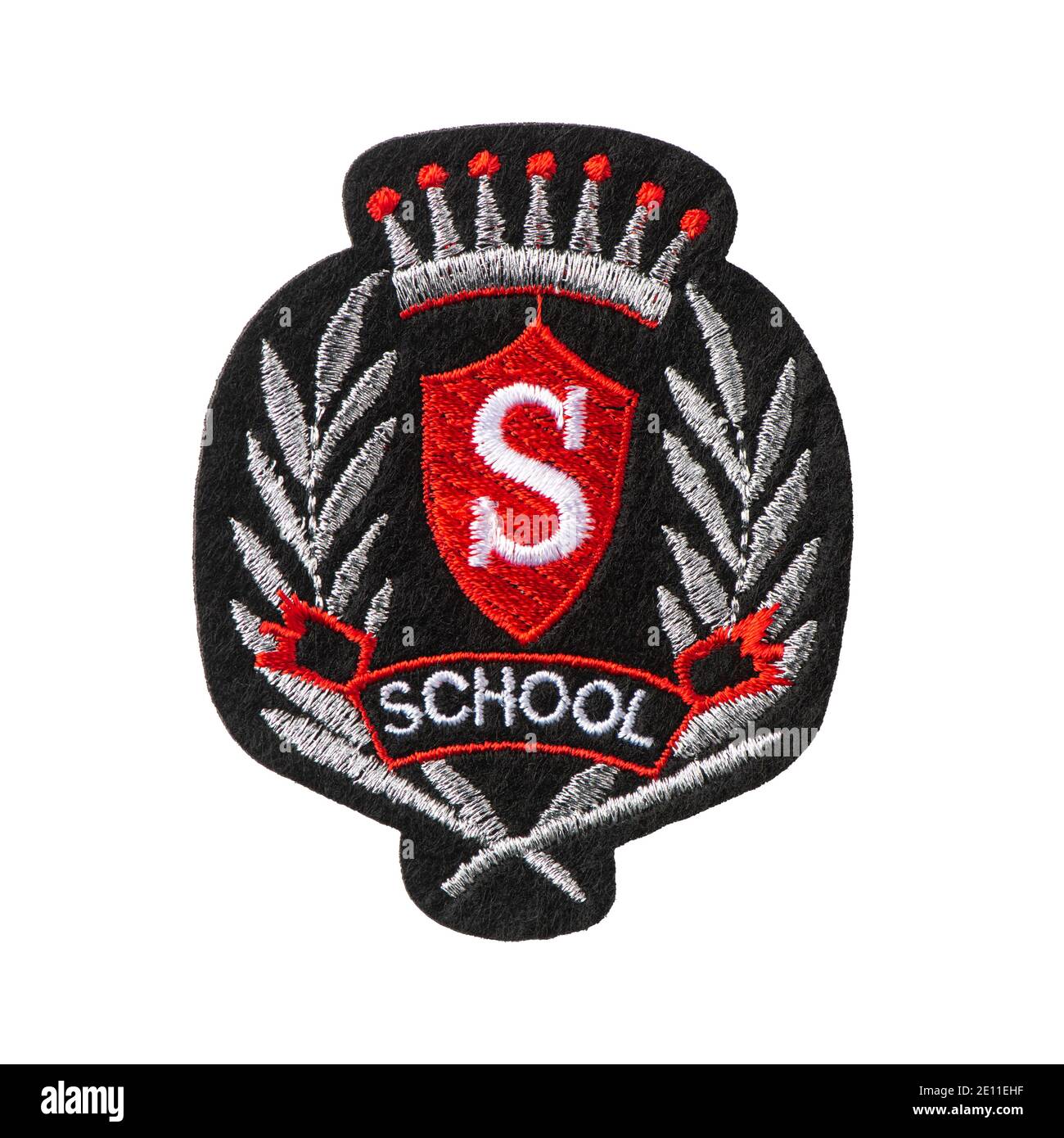 Schwarzes Abzeichen des Schülers mit einem Emblem der Schule isoliert auf Weißer Hintergrund Stockfoto