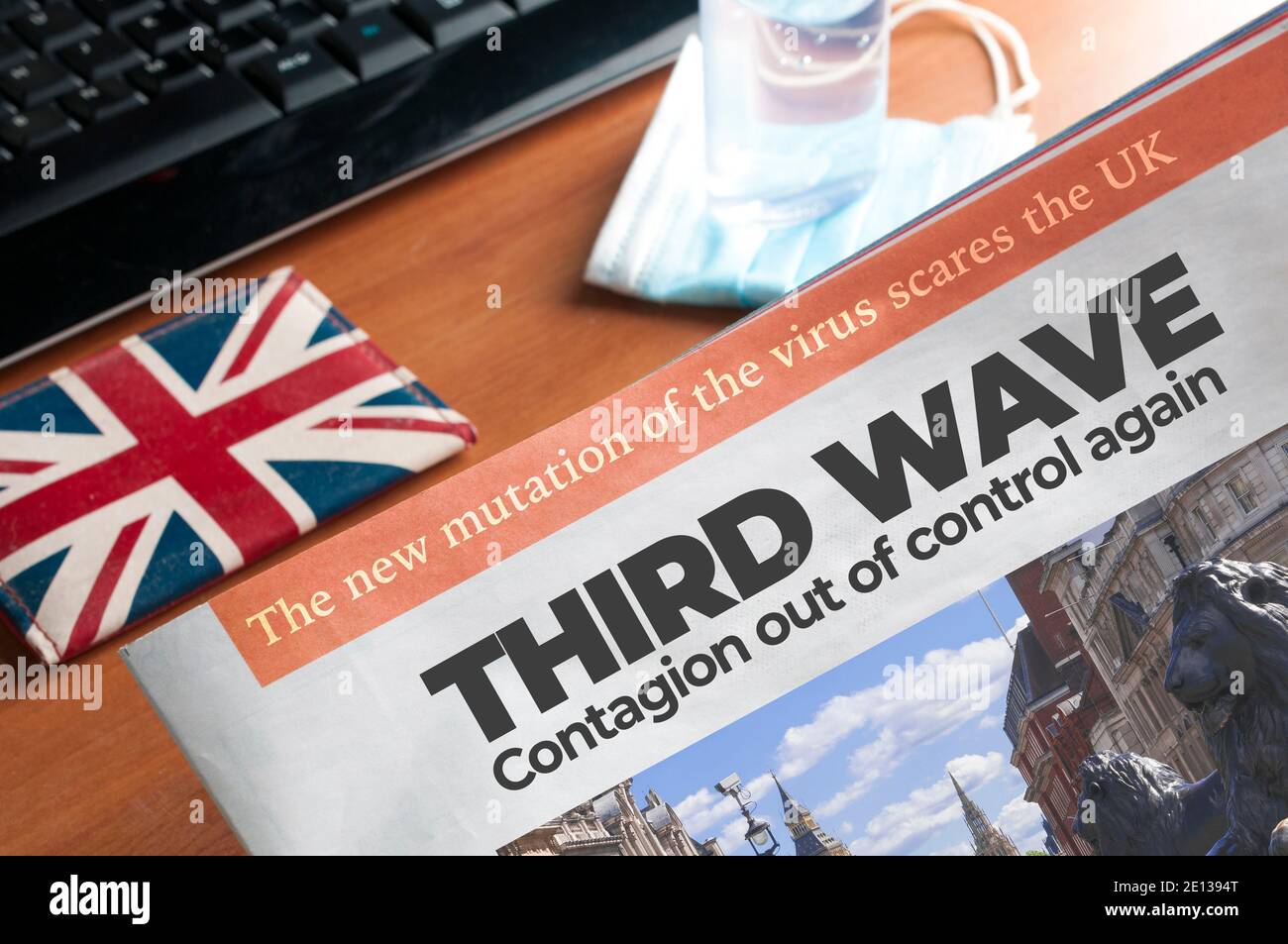 Covid-19 UK Third Wave Concept: Eine Zeitung mit der Überschrift "Third Wave" Stockfoto