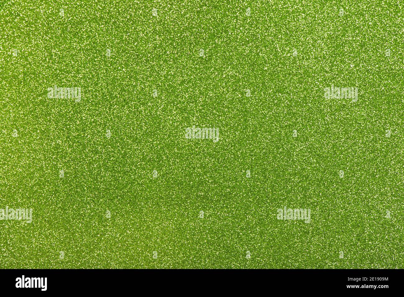 Grüne Glitzerstruktur. Festlich glänzender Hintergrund Stockfoto