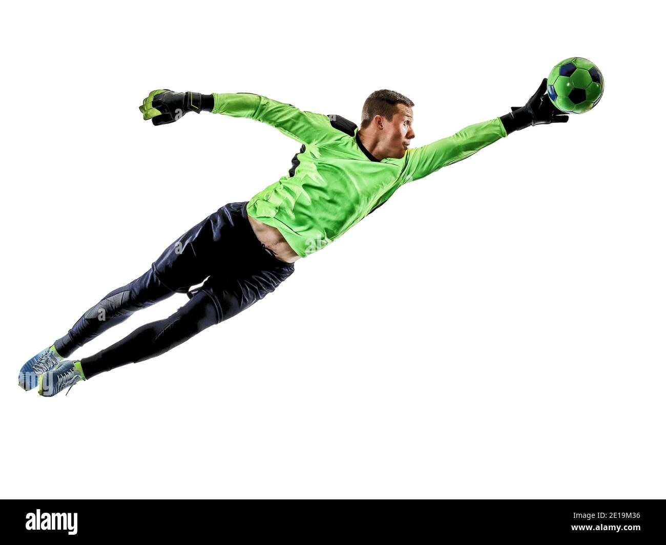 Ein kaukasischer Fußballtorhüter im Schatten der Silhouette im Studio, isoliert auf weißem Hintergrund Stockfoto