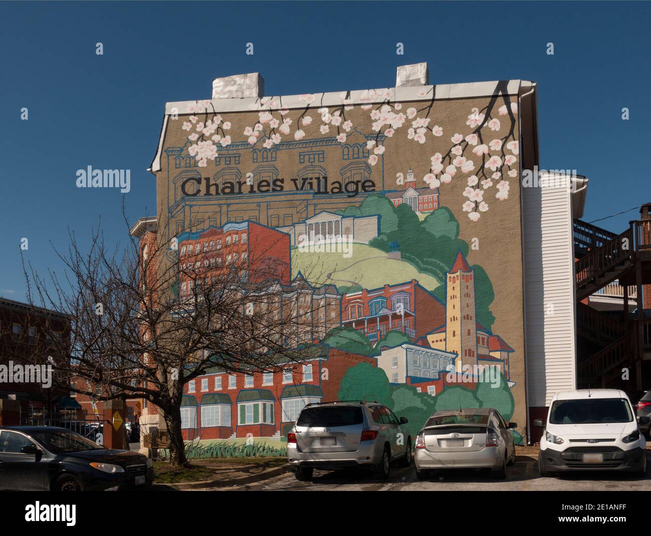 Willkommensschild zum Charles Village in Baltimore MD Stockfoto