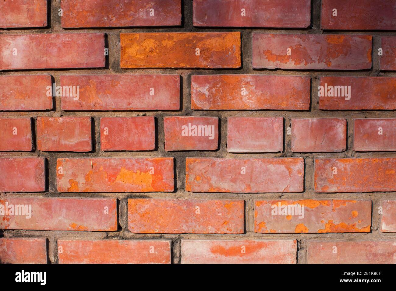 Alt Beton orange Farbe Blöcke Wand Textur Hintergrund Stockfoto