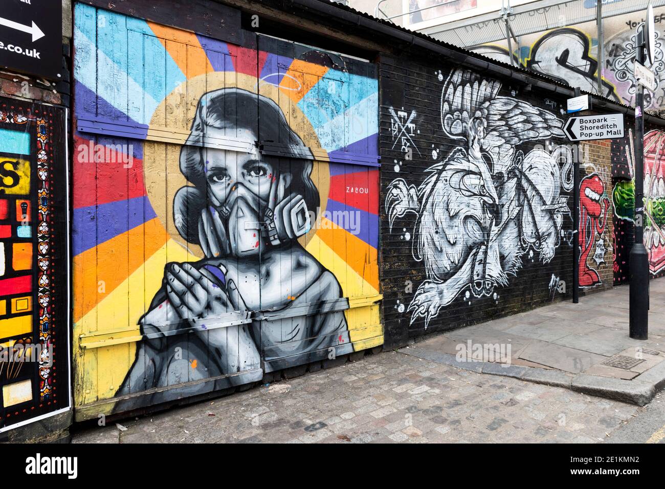 London, England: 24. Mai 2017. Street Art des französischen Künstlers Zabou (L) und des Londoner Künstlers ThisOne(R) Brick Lane, Shoreditch, London, Großbritannien. Alamy Stockbild/ Stockfoto