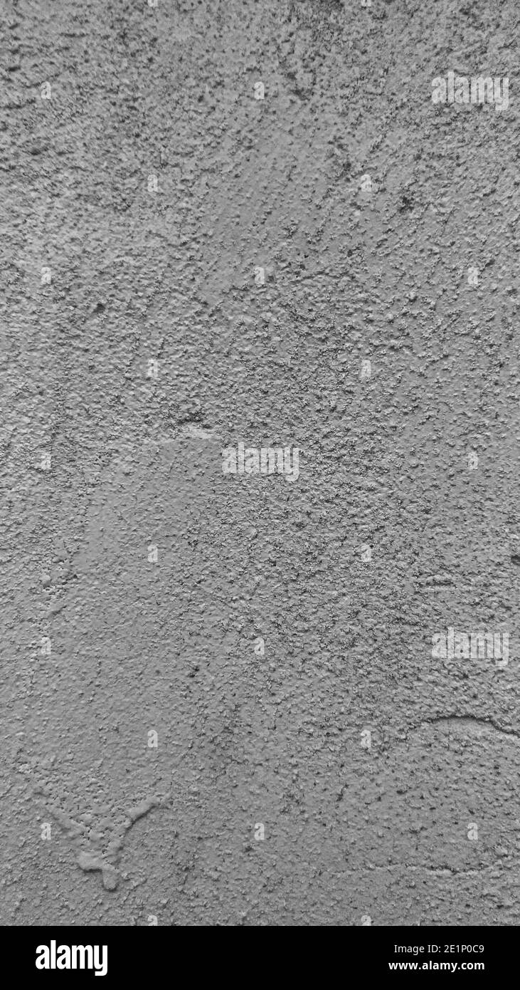 Detaillierte Textur von Straßenputz mit Unregelmäßigkeiten Stockfoto
