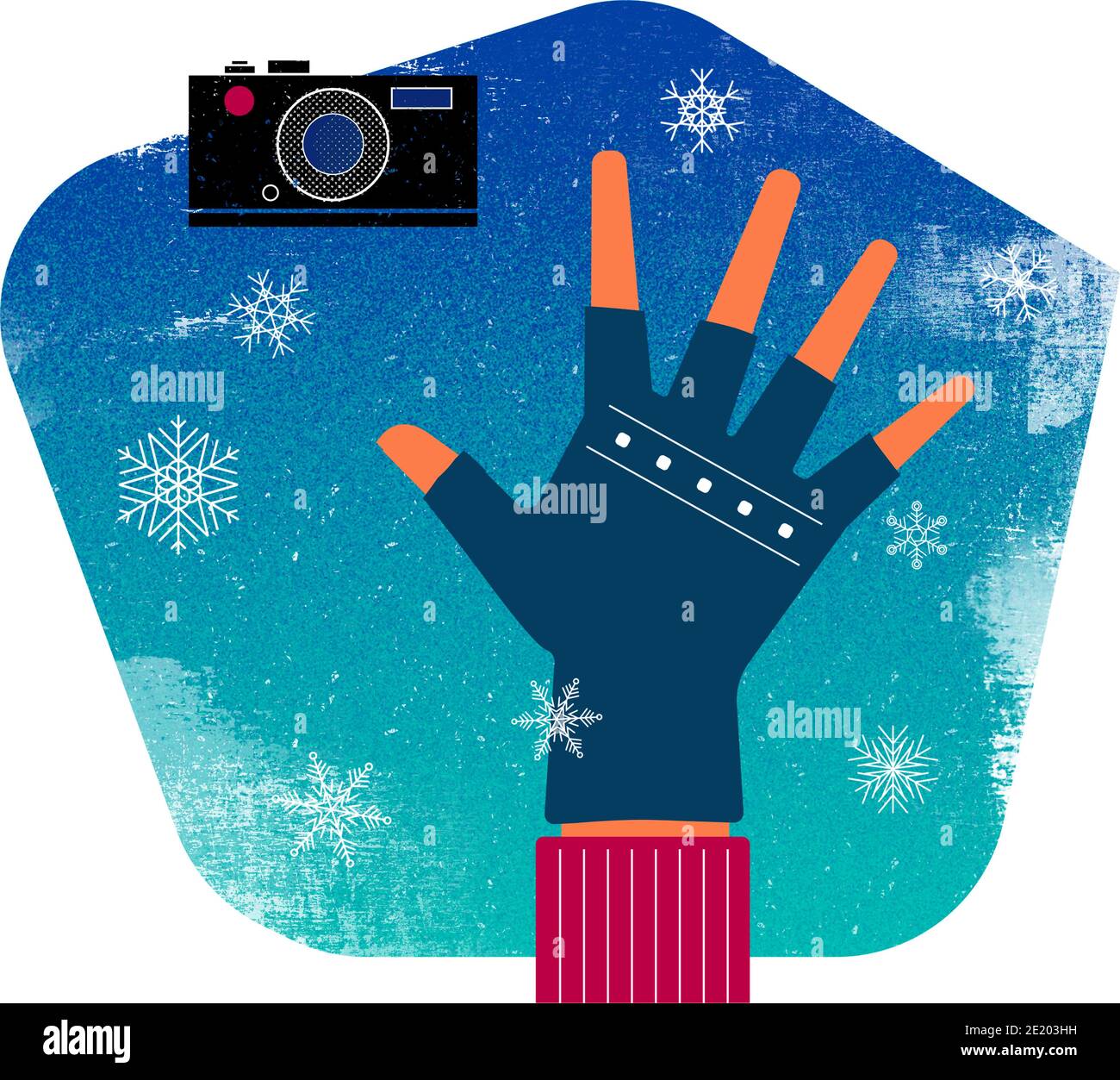 Hand in fingerlosen Handschuhen, Kamera, Schneeflocken - Fotografie im Winter Stockfoto