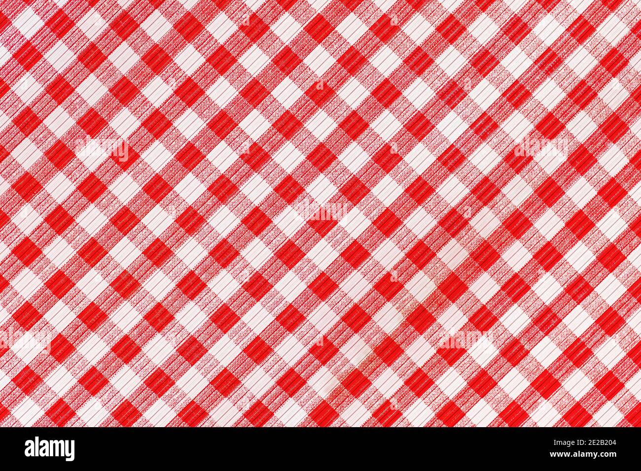 Rot und weiß abstrakter karierter Hintergrund, karierte Picknick-Tischdecke, Stoffmuster Textur. Stockfoto